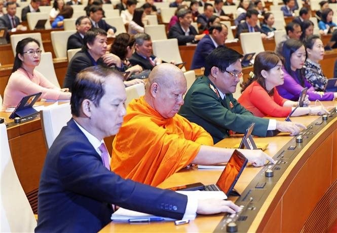 vna_potal_10_su_kien_noi_bat_cua_viet_nam_nam_2024_do_ttxvn_binh_chon-su_kien_9_thong_qua_luat_dat_dai_sua_doi_7774116.jpg