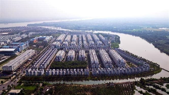 vna_potal_10_su_kien_noi_bat_cua_viet_nam_nam_2024_do_ttxvn_binh_chon-su_kien_9_thong_qua_luat_dat_dai_sua_doi_7774117.jpg